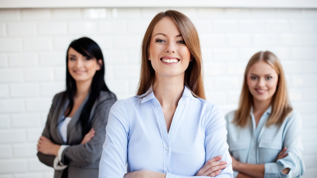 a group of women smiling-Personal Brand 2025